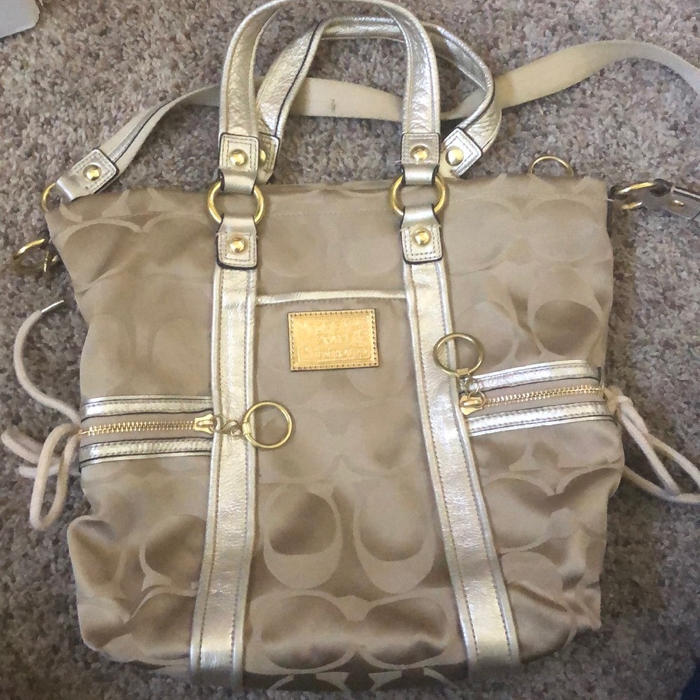 Gold tone coach bag